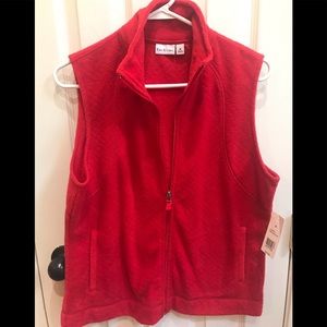 Kim Rogers red vest